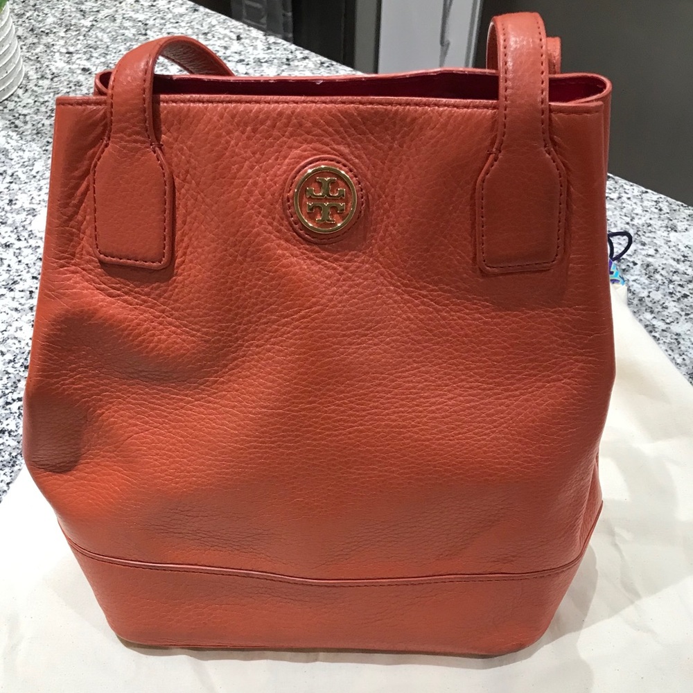 Tory Burch orange bucket bag